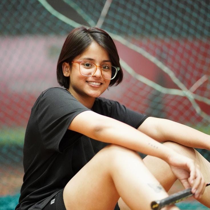 Portrait of Mira Chen, group coordinator and fusion cooking expert